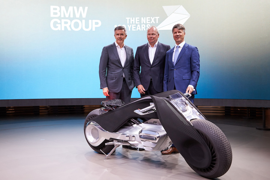 BMW GROUP THE NEXT 100 YEARS. "Iconic Impulses. The BMW Group Future Experience". World Premiere of the BMW Motorrad VISION NEXT 100. Press Conference 11 October 2016, Los Angeles, The Barker Hangar. Peter Schwarzenbauer, Member of the Board of Management of BMW AG, MINI, Motorrad, Rolls-Royce, Aftersales. Stephan Schaller, President BMW Motorrad. Harald Krüger, Chairman of the Board of Management of BMW (10/2016)