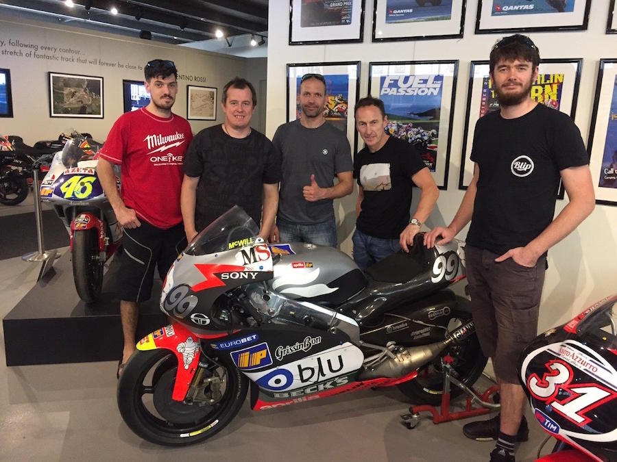Jeremy McWilliams shows his UK IC team mates his 2000 Aprilia RSV 500, part of the new GP motorcycle collec copy