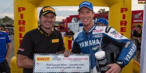 Wayne Maxwell accepts the Pirelli Superpole award from Don Nicholas.