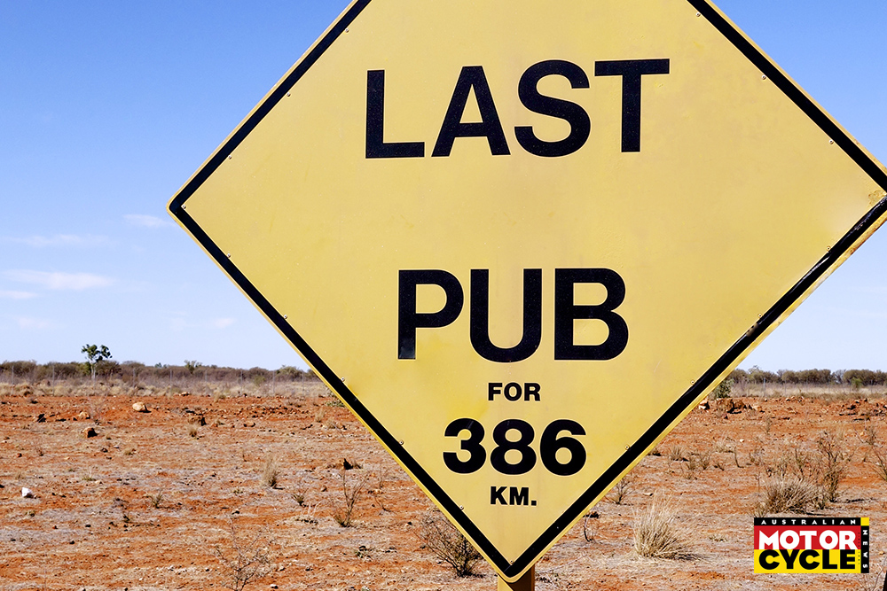 Last Pub for 386 km sign in outback Australia